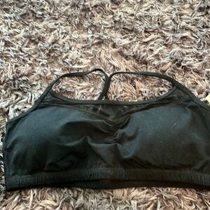 New York and Company size XL sports bra with padding and mesh back.